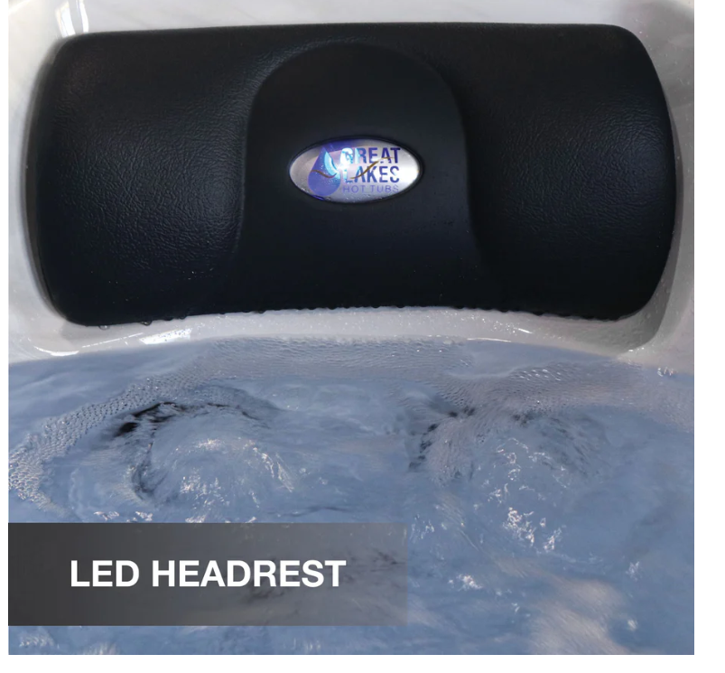 Black LED headrest with a brand logo on top of a hot tub.
