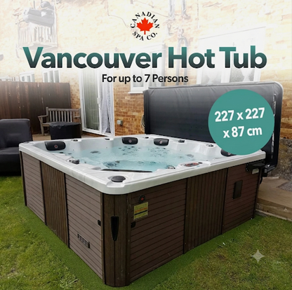 Vancouver hot tub with dimensions displayed, set outdoors.