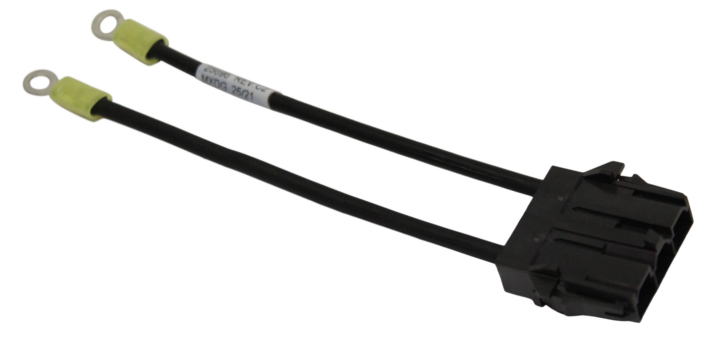 Black electrical connector with two green wires on a white background