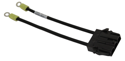 Black electrical connector with two green wires on a white background