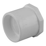 White plastic plumbing fitting on a white background